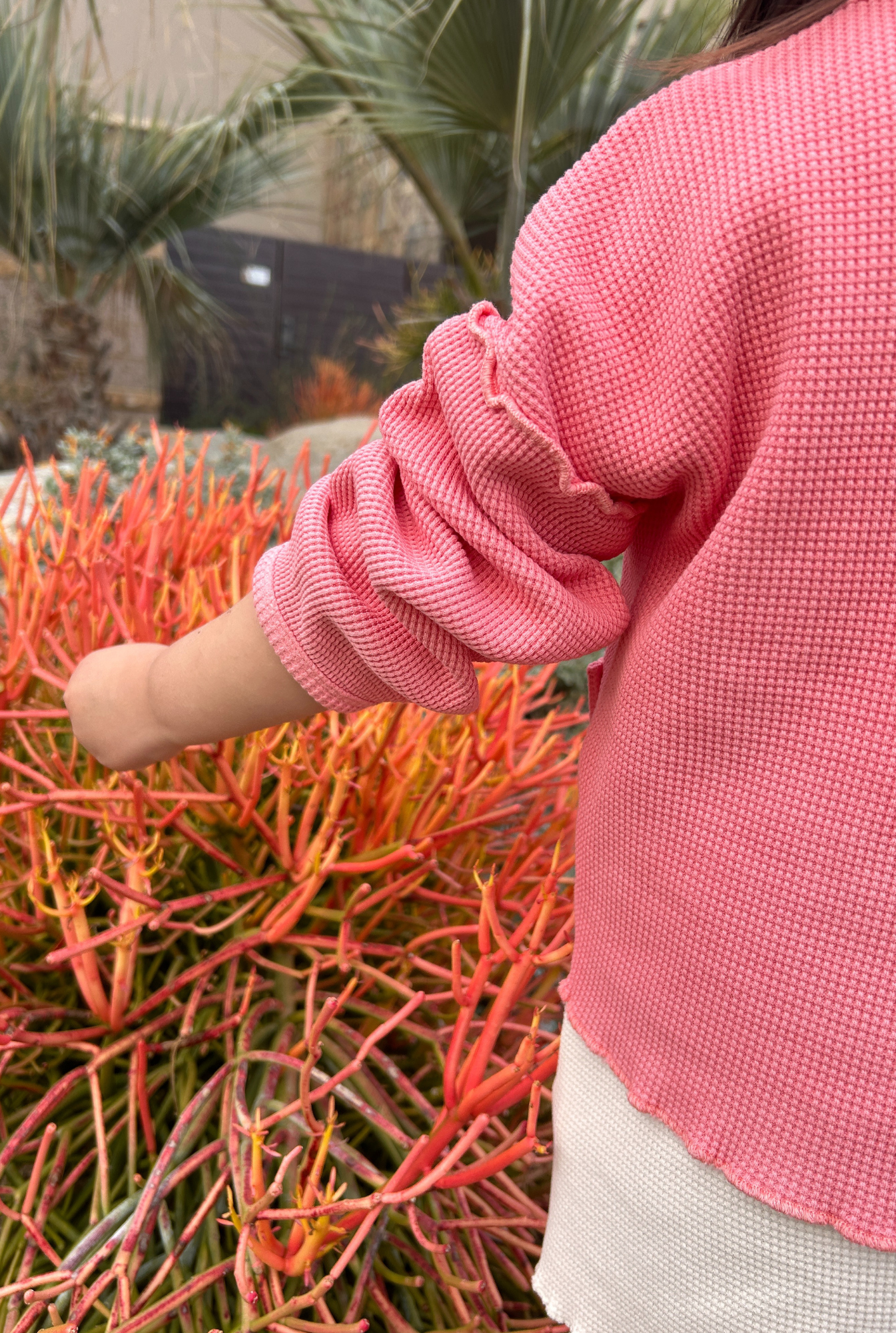 Comfortable and colourful long sleeve top in pink. Made from organic cotton waffle.
