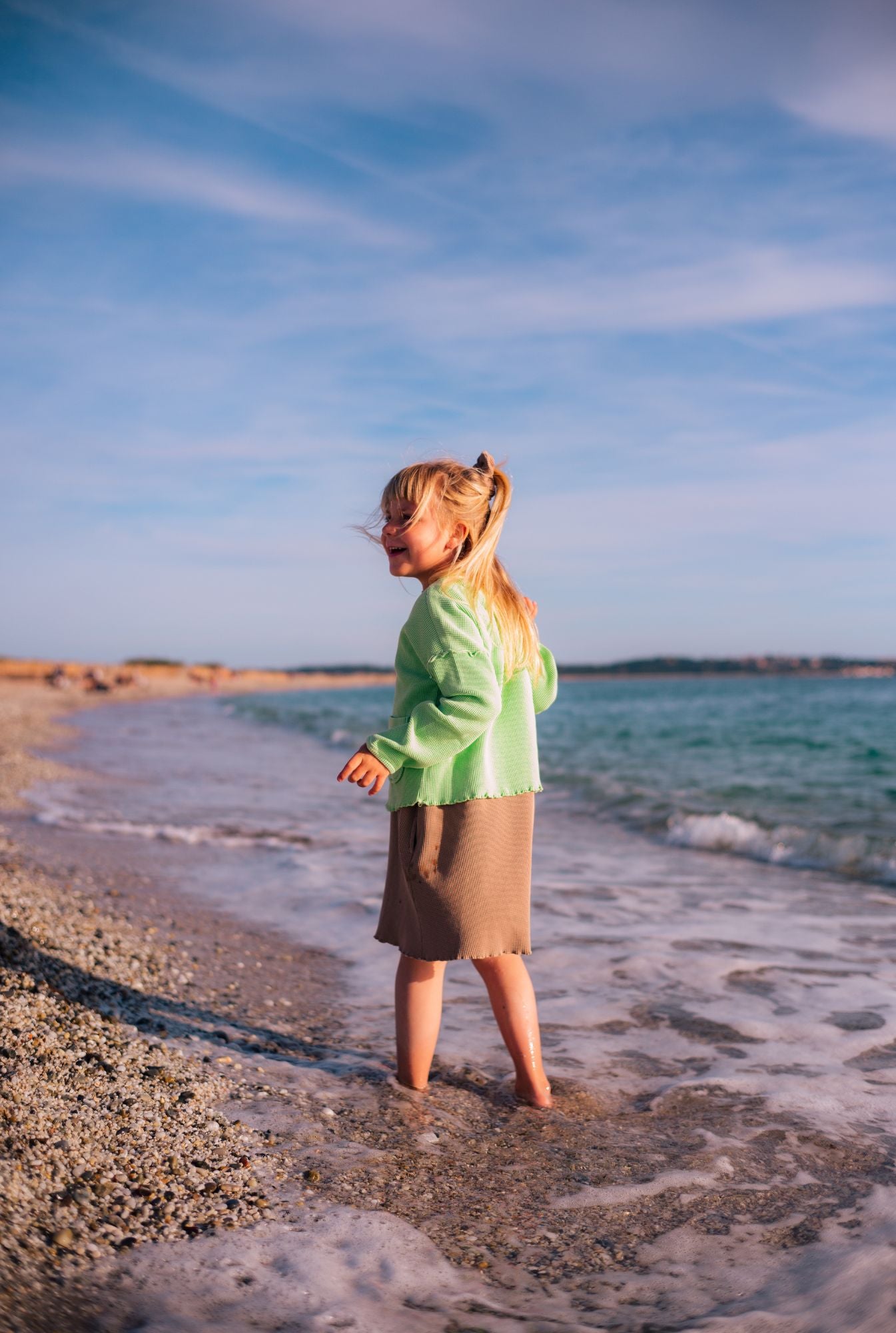 Organic summer outfits by Tiny Advocates for kids 12 months - 7 years.
