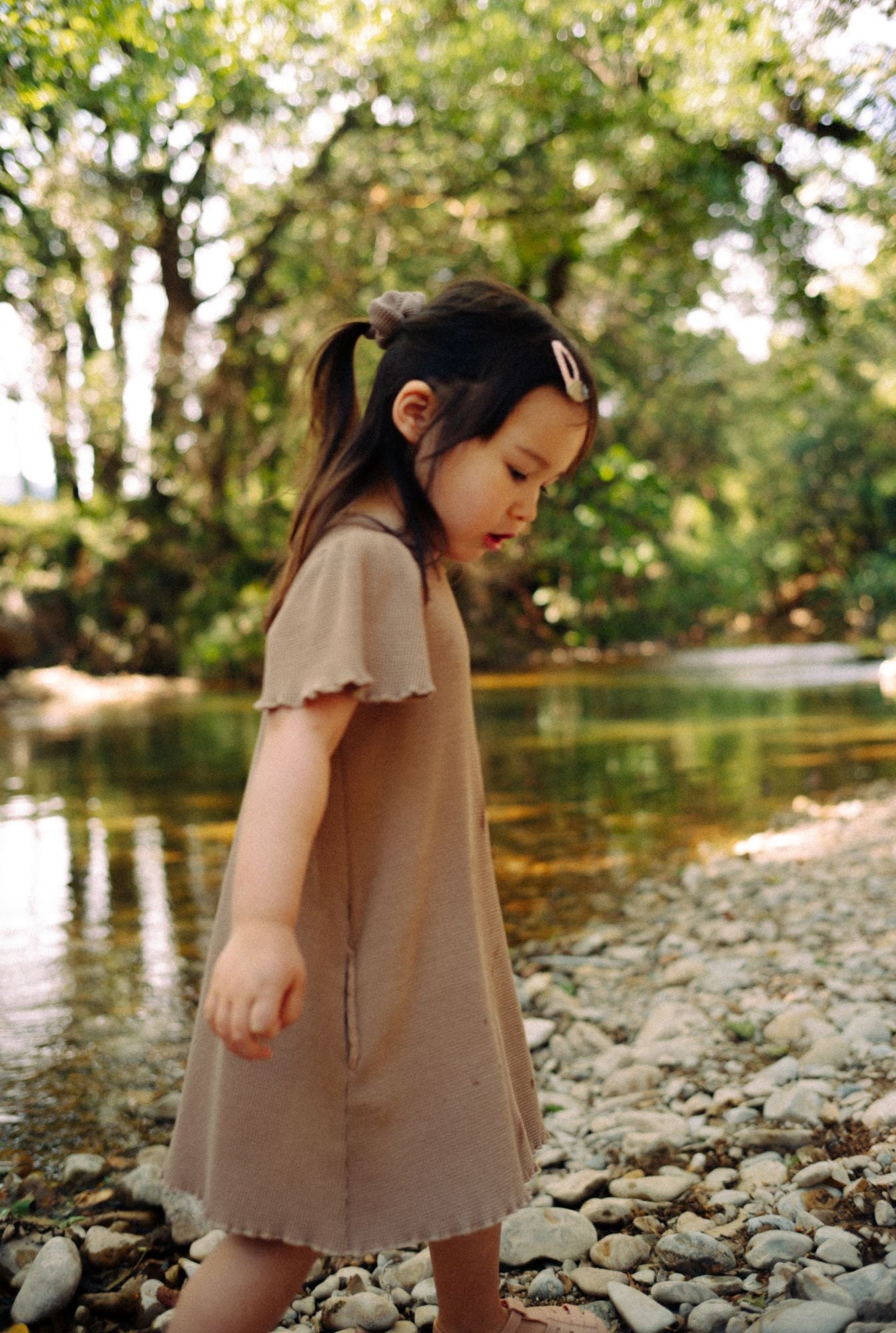 River play in Tiny Advocates dress. Made from buttery-soft organic cotton waffle, it is comfortable, stylish and fun to wear. Cute sleeves and functional pockets are a plus.