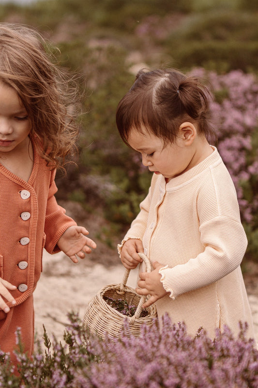 This blog post is about slow fashion and a few tips on how to introduce slow fashion to our kids. Fun and easy things parents can do with kids to teach them to care for their clothes. 